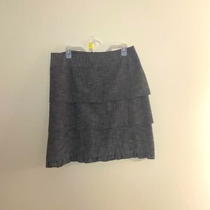 Double Pleated Skirt Adorned with a Ruffled Bottom